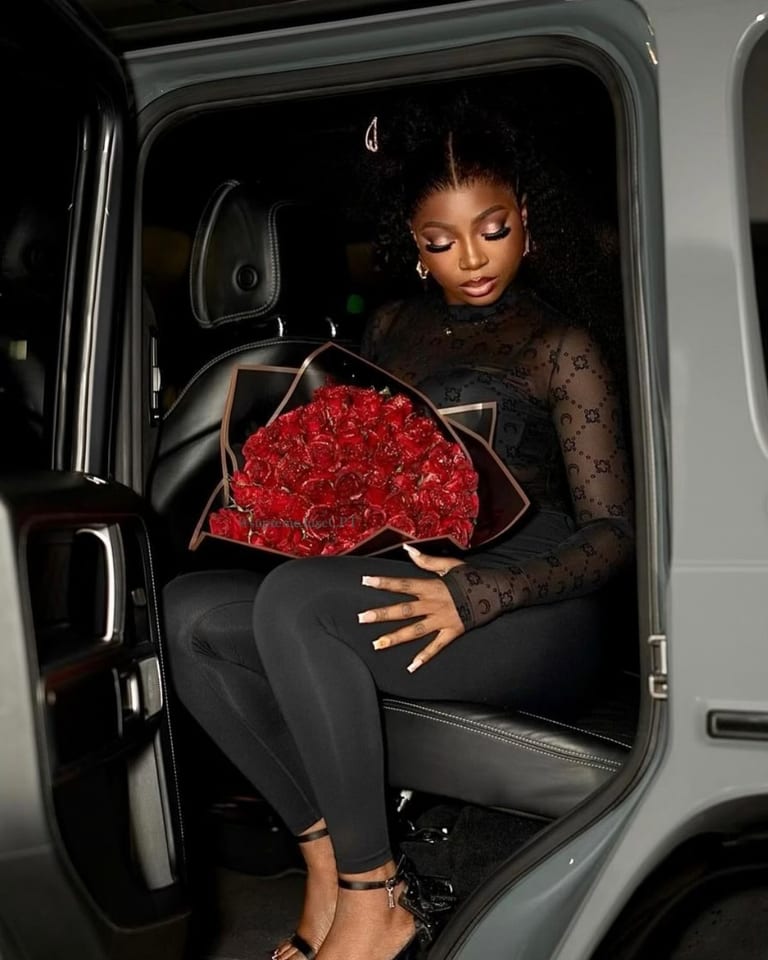 The Devotion — fifty red and black glitter roses